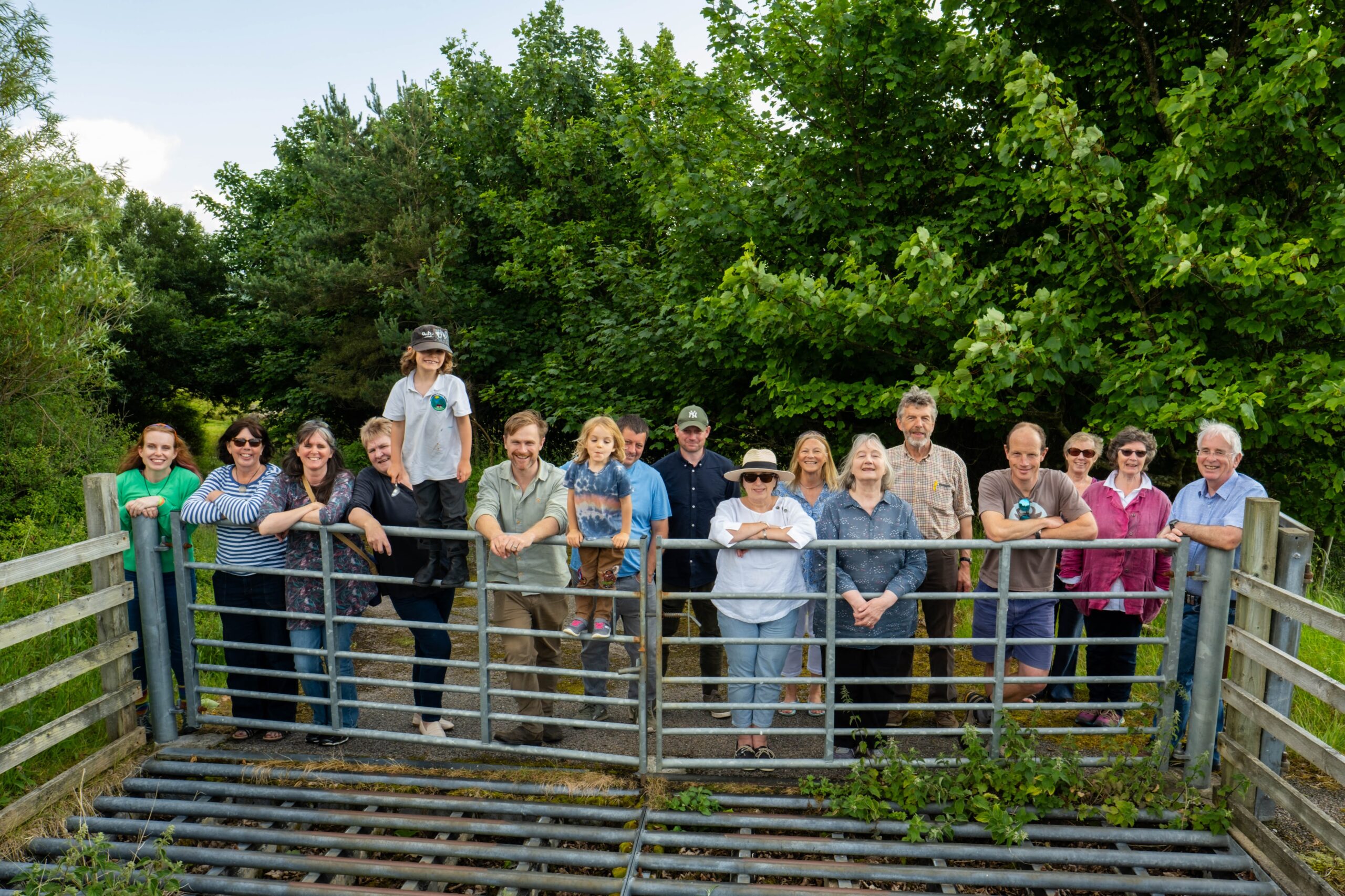 Group shot of CCDC Board, staff and supporters taken when they bought the land in June 2023